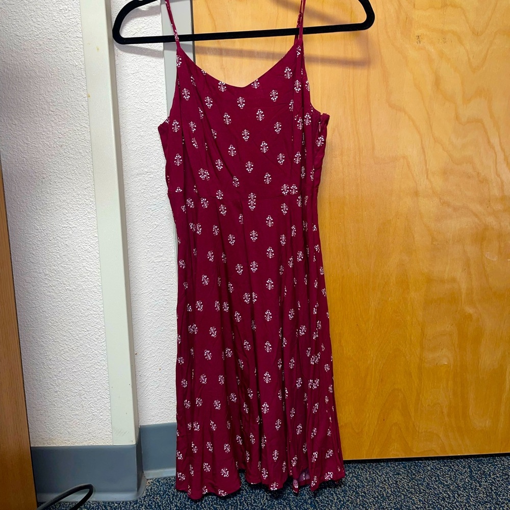 Maroon dress.